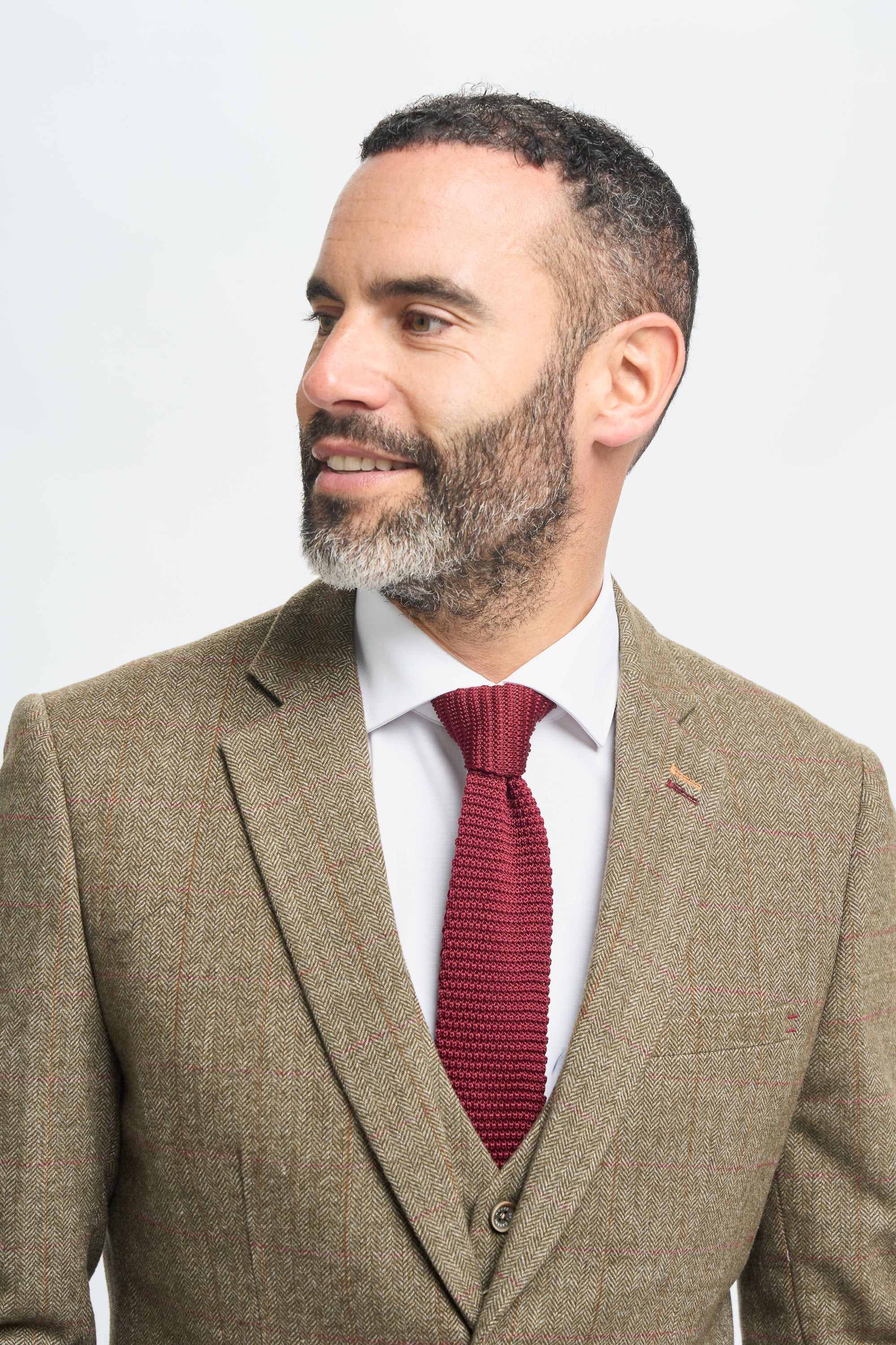 Herrenanzug aus olivgrünem Tweed mit Karomuster