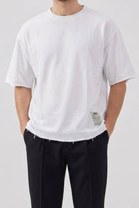 Weißes Herren-T-Shirt mit lockerer Passform, offener Kante, Rundhalsausschnitt, Baumwollmischung
